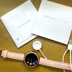 Rose Gold Michel Kors Access smart watch.